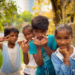 Kids hamming it up at the Banganga Temple Tank — Mumbai, India.