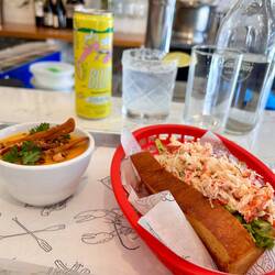 crobster sandwich with a small sweet potato soup