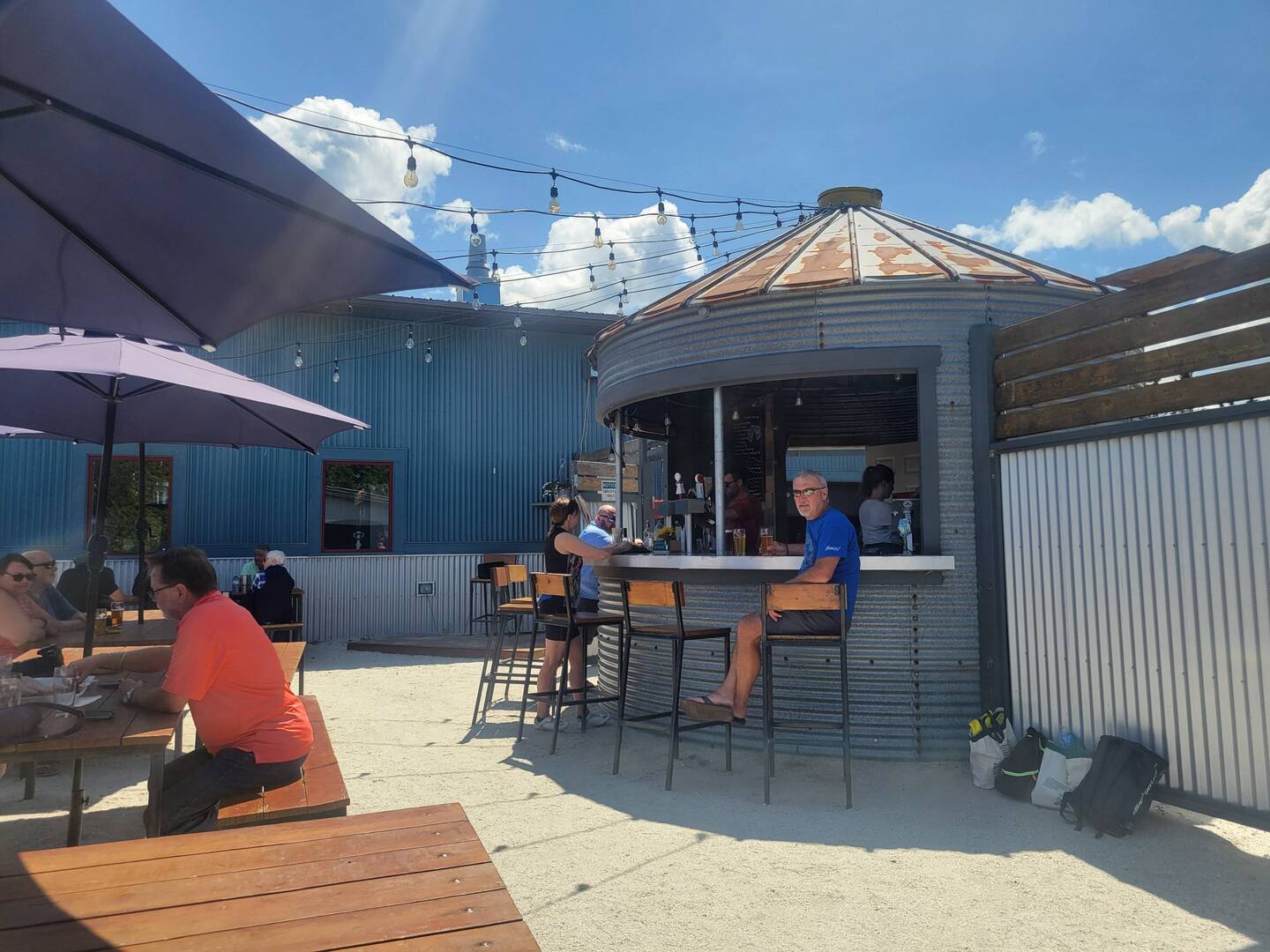 We love the brewery in Little Current. Randy at the bar and our groceries in the shade.