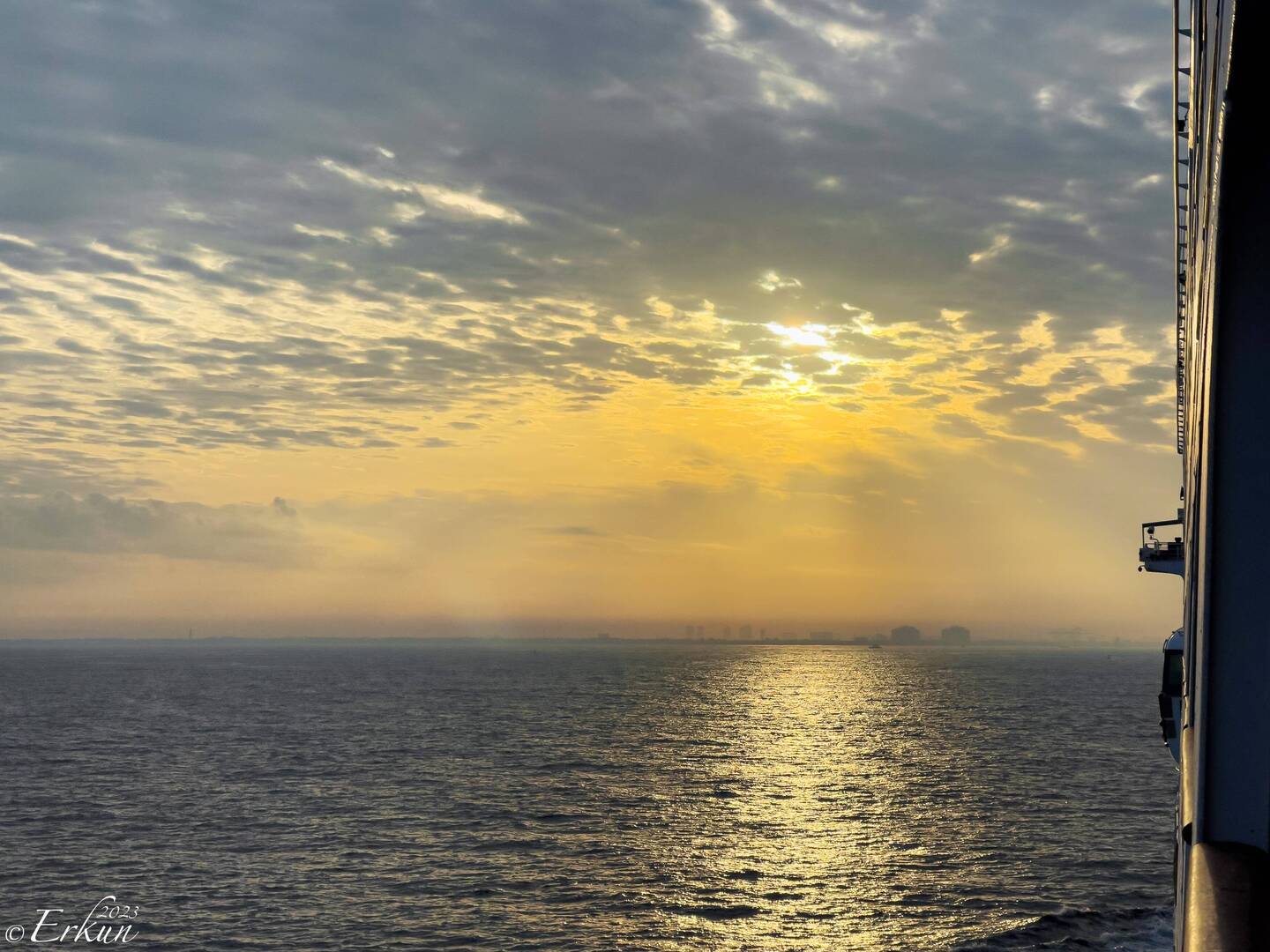 Hazy sunrise on approach to Kochi, India.