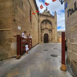 Kids playing on the gates used for the running of the bulls