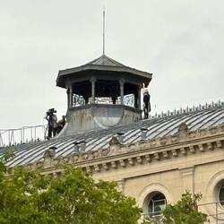 Note the torch bearer on the right