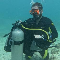 Practicing taking our BCD off underwater