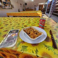 Found a small cluttered store and bought some marinara paella to make in the microwave