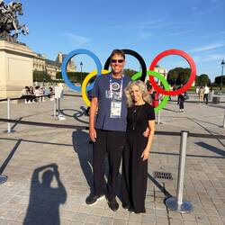 Barb and Jeff at the Olympics rings at The Louvre.