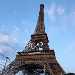 The Olympic Rings turned white as the sun set.