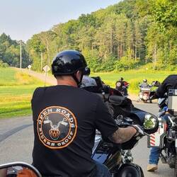 The group organizer, Peter, made up these shirts