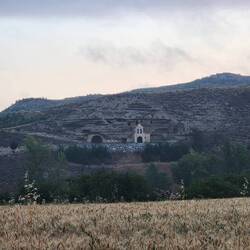 Building tucked into the hill
