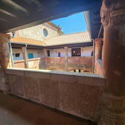 overlooking the courtyard below