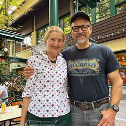 This woman and her brother own the beer garden. Thomas played with her as a child.