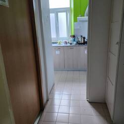 Kitchen entrance, bathroom on the left