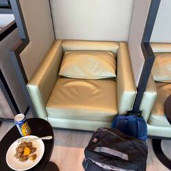 My seat at the Extime Lounge, along with my last orangina.