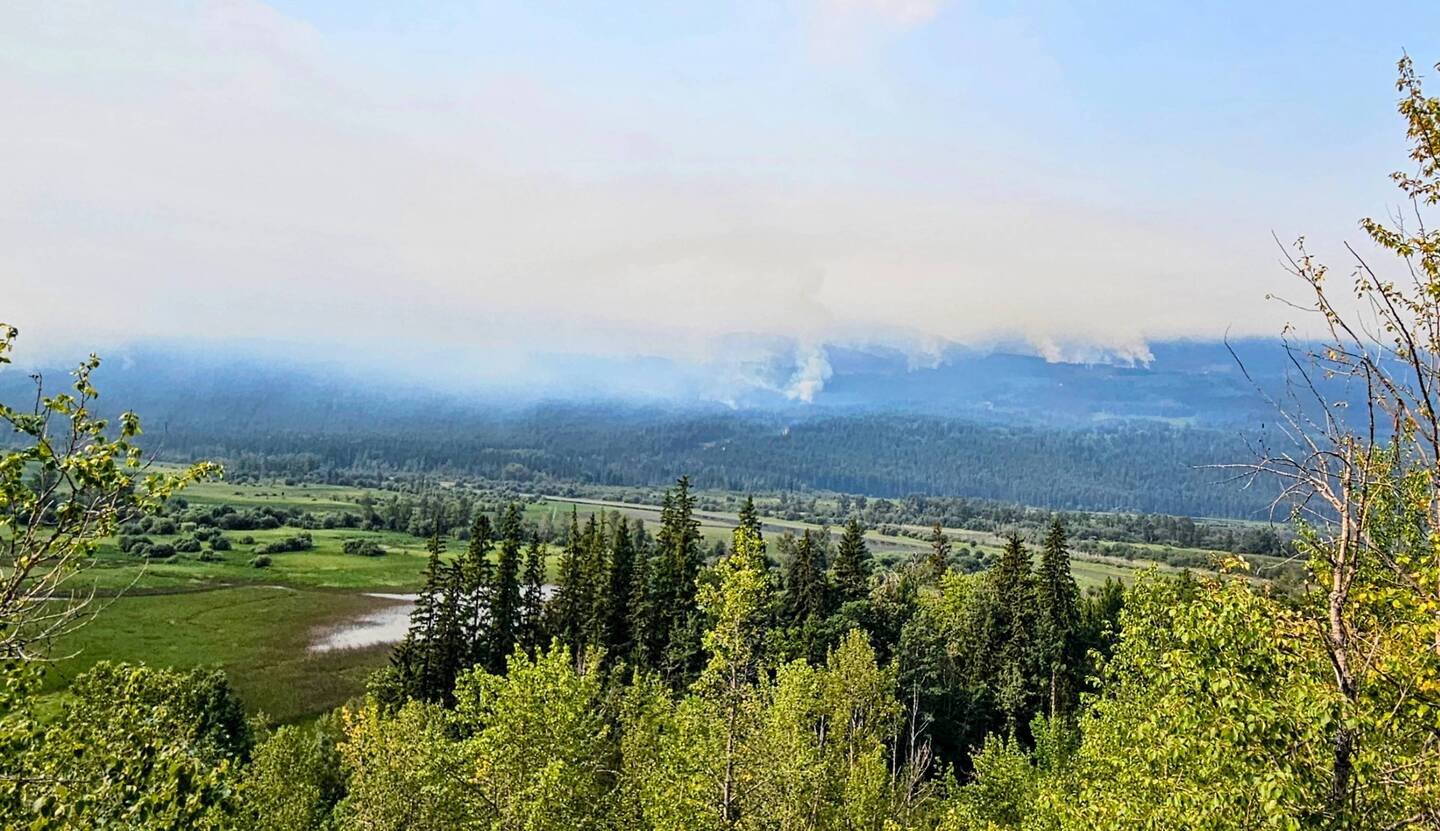 Dense wildfire smoke obscures the tall mountains outside Golden in the Columbia River Valley