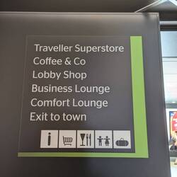 Signs to help you make your way about onboard. "Exit to town?"