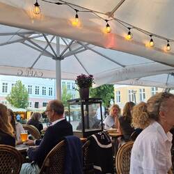 Had dinner here. Our apartment is just to right of umbrella pole.