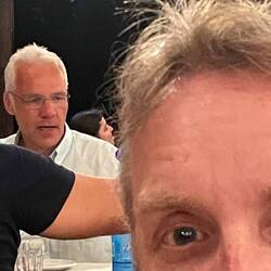 Greek Steve Martin in the background