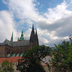 A pretty church with a Christian youth fair outside.