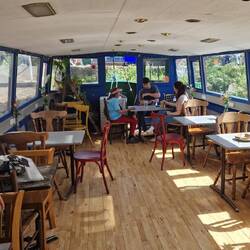 We visited the café boat moored in the dock on the way back for coffee and a chocolate treat