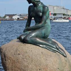 The Little Mermaid. For Hans Christian Andersen's book. Hans was born in Denmark.