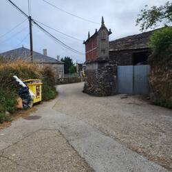 Horreo: The raised structure to the right is for storing grain & raised so rats can't get to it.