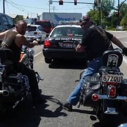 After bagging me for riding without a helmet, these two then decided to try it for themselves