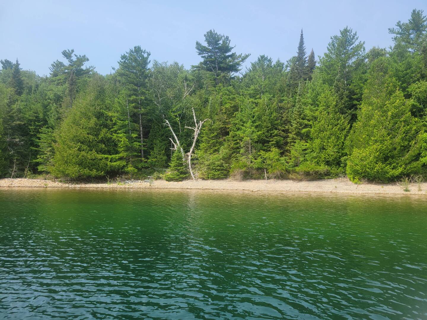 Our point of reference to drop the anchor. Good depth to shore and great holding.
