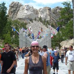 The 56 flags flyint at Mt Rushmore represent 50 States, 1 District 3 Territories & 2 Commonwealths
