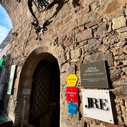 The entrance to Strelec with a dragon above the door