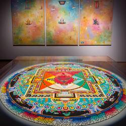 Mandala by the monks of Seraje Monastery (foreground) and "The Three Precious Jewels" by K. Phuntsok