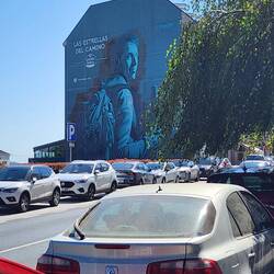 A mural of a pilgrim that likes Estrella beer