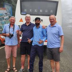 Our driver sporting a new hair cut with his 3 co drivers!