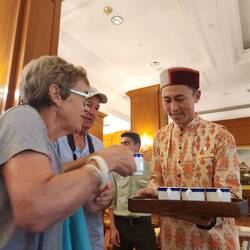 Being offered delicious clove and apple tea