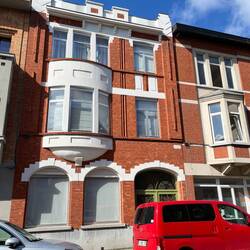 The long vertical lines and the brick forward, and the color