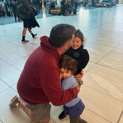 A tough goodbye with the girls at Auckland Airport