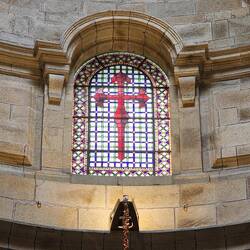 The cross of Santiago: red for the blood of St. James when he was beheaded