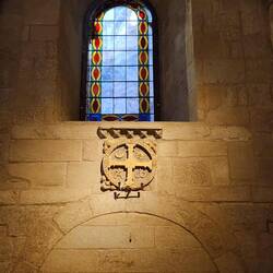 Stained glass window and the Rosetta symbol that is repeated throughout the cathedral