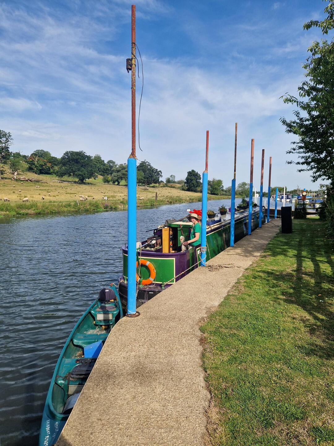 Filling with water at the start of the cruise. The blue posts indicate visitor moorings.