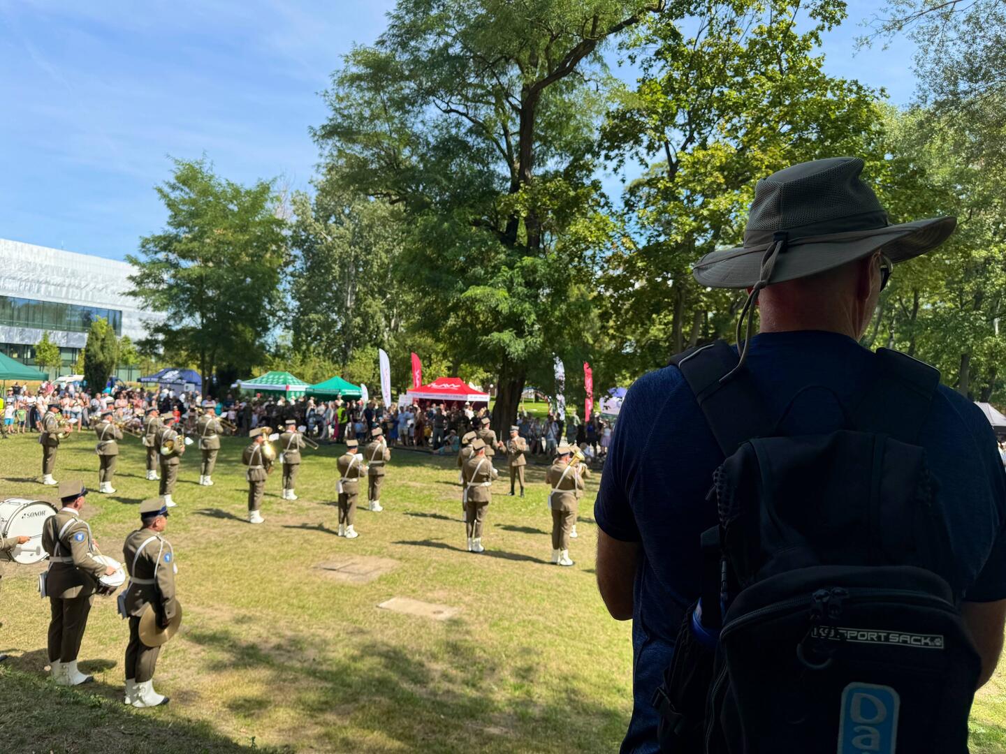 Bill watching a regimental band practicing before the parade