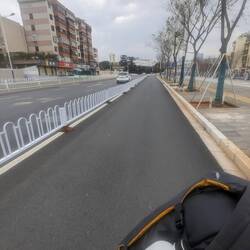Riding a bike to another hotel.