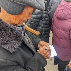 The old man writing his note to us.