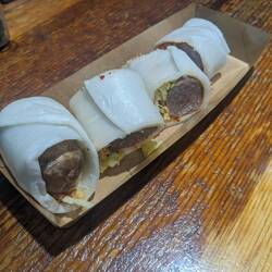 Light dinner after all the food at the market. Homemade sausage in rice paper roll.