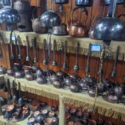 Cute shop selling tea sets and music instruments.