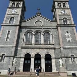 St. Patrick and St. Francis flank the stairs of the Basilica