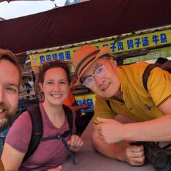 We ate a huge egg and this friendly man from Harbin took a photo, so we took a photo with him too