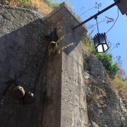 A large. pair of balls hanging freely from the walls