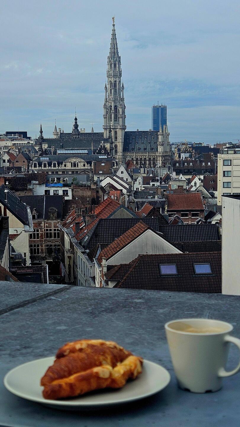 We are right above a French bakery. Today I brought my almond croissant up to our terrace.