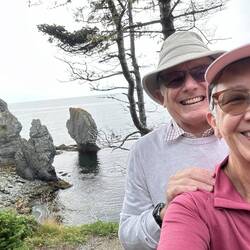 A selfie with sea stacks in the background