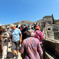 Crowds crossing the bridge