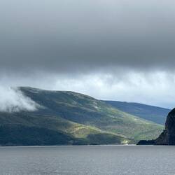 The sun breaking through the clouds over Bonne Bay