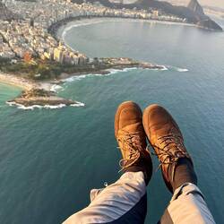 Feet pointing to Copacabana beach